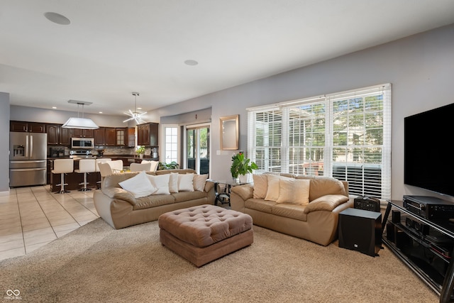 2847 Macintosh, Columbus, IN 47201 - living area featuring light tile patterned flooring and light carpet