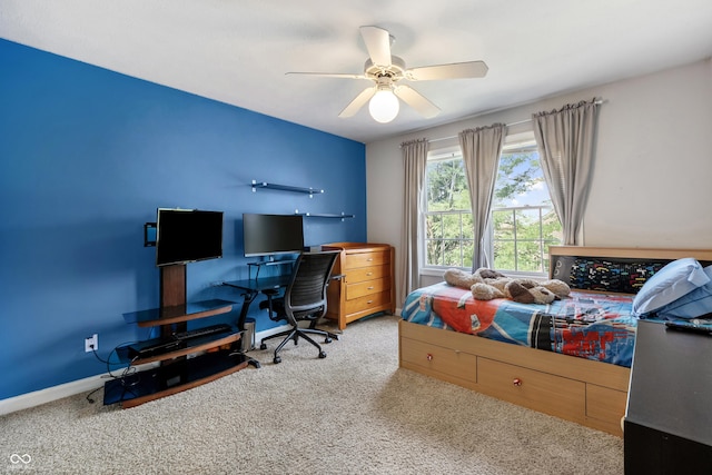 2847 Macintosh, Columbus, IN 47201 - carpeted bedroom with an office area and ceiling fan