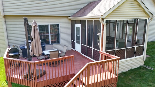 2847 Macintosh, Columbus, IN 47201 - wooden terrace featuring a sunroom, outdoor dining space, and a yard