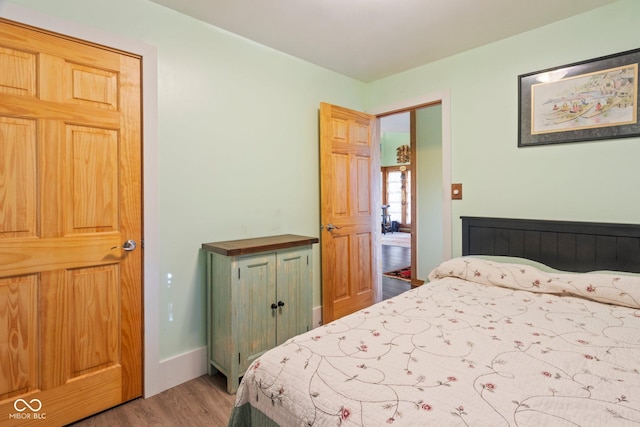 7437 Center Lake Rd, Nineveh, IN 46164 - bedroom featuring light wood-type flooring and baseboards