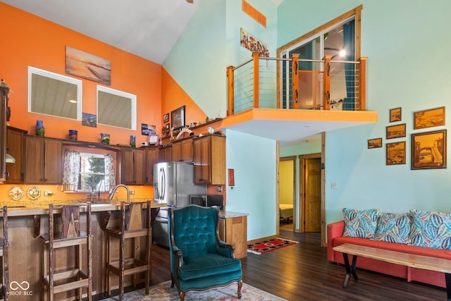 7437 Center Lake Rd, Nineveh, IN 46164 - living room featuring a high ceiling and dark wood-style flooring