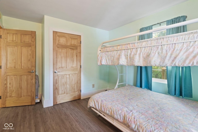 7437 Center Lake Rd, Nineveh, IN 46164 - bedroom with wood finished floors and multiple windows