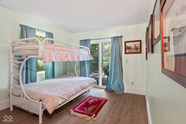 7437 Center Lake Rd, Nineveh, IN 46164 - bedroom with wood finished floors and access to outside