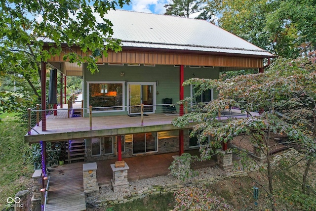 7437 Center Lake Rd, Nineveh, IN 46164 - rear view of house featuring a deck and a metal roof