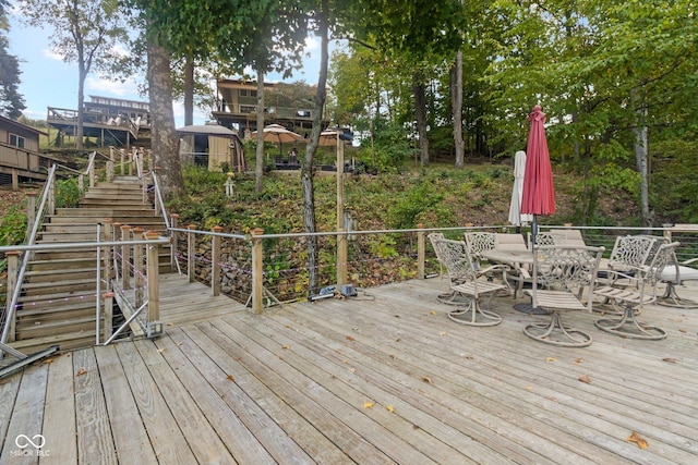 7437 Center Lake Rd, Nineveh, IN 46164 - wooden terrace featuring stairway and outdoor dining area
