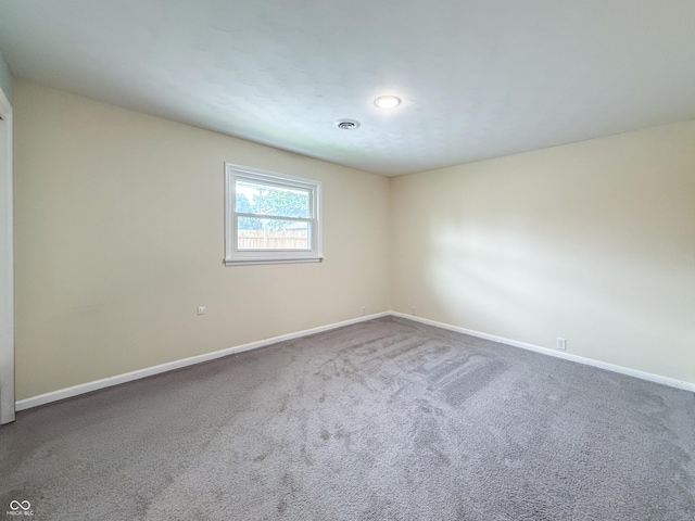 8883 W Hilltop Ln, Elwood, IN 46036 - carpeted spare room with baseboards