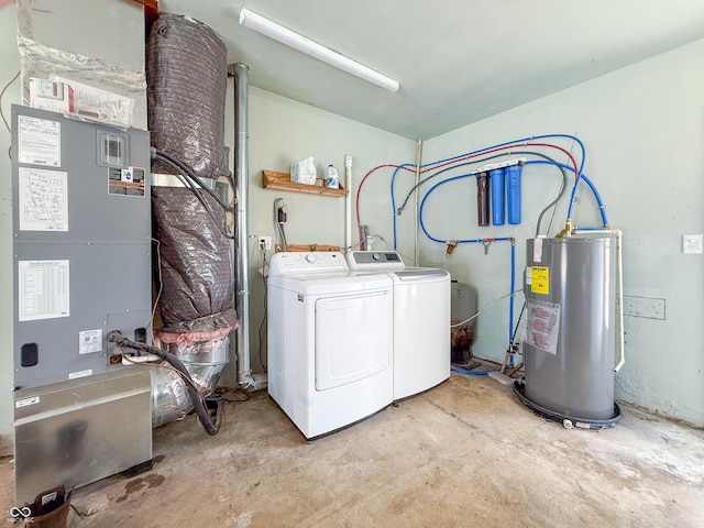 8883 W Hilltop Ln, Elwood, IN 46036 - laundry area featuring water heater, washing machine and dryer, and heating unit
