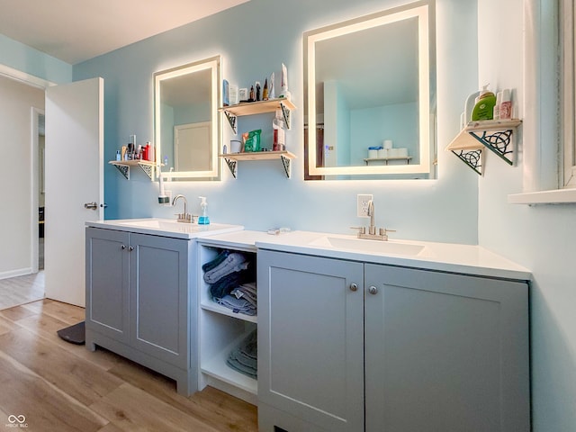 8883 W Hilltop Ln, Elwood, IN 46036 - bathroom featuring vanity and wood finished floors