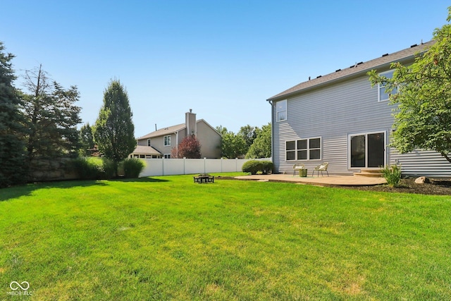 10792 Sawgrass Dr, Fishers, IN 46037 - fenced backyard with an outdoor fire pit and a patio
