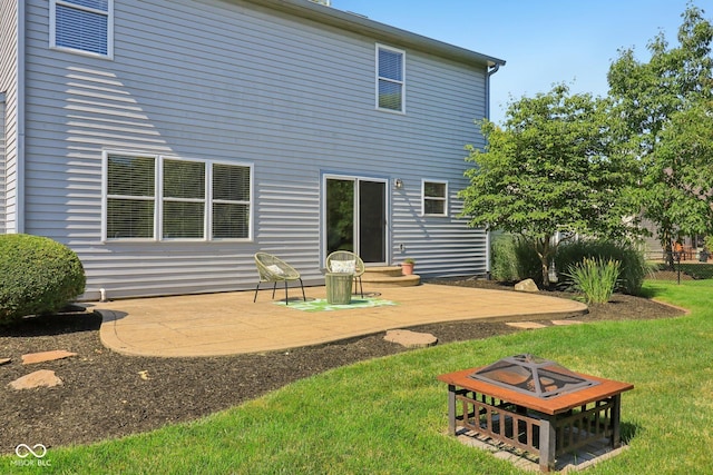10792 Sawgrass Dr, Fishers, IN 46037 - rear view of property with a fire pit and a patio area