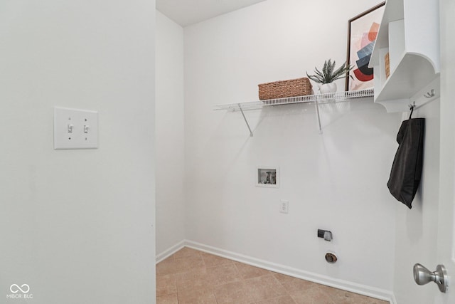 10792 Sawgrass Dr, Fishers, IN 46037 - washroom featuring washer hookup and light tile patterned floors