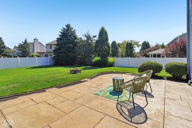 10792 Sawgrass Dr, Fishers, IN 46037 - fenced backyard featuring a patio and an outdoor fire pit