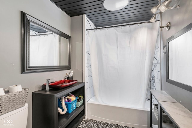 43 W Main St, North Vernon, IN 47265 - bathroom featuring shower / bath combination with curtain and toilet