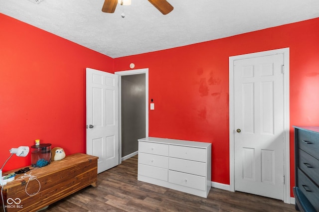43 W Main St, North Vernon, IN 47265 - bedroom with dark wood finished floors, a textured ceiling, and ceiling fan