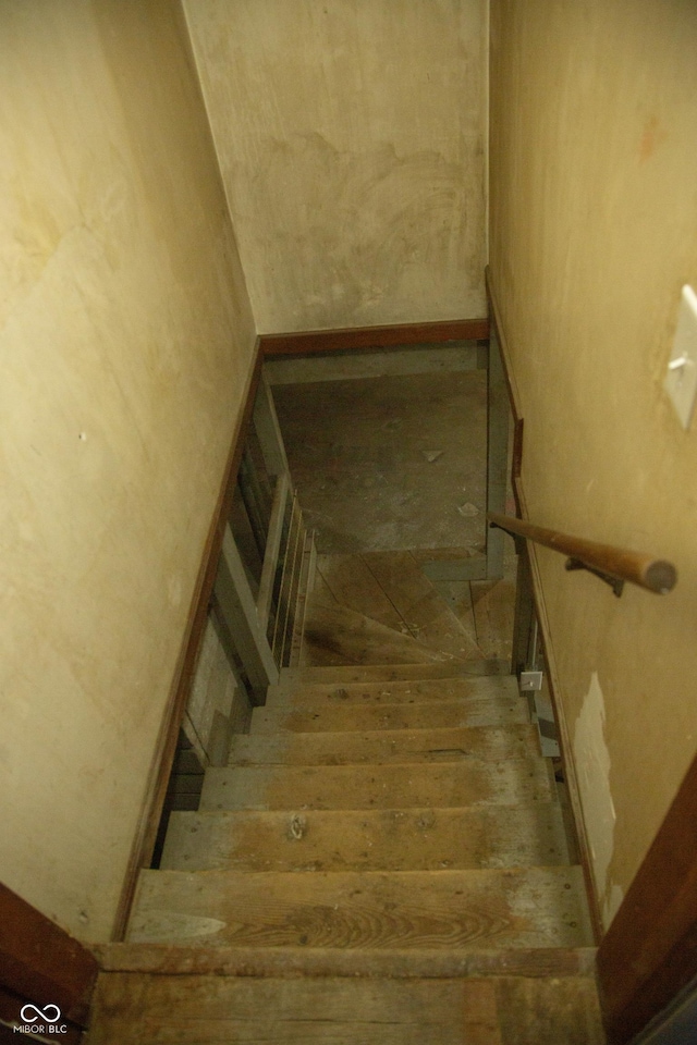 12 E N St, New Palestine, IN 46163 - stairway featuring wood finished floors