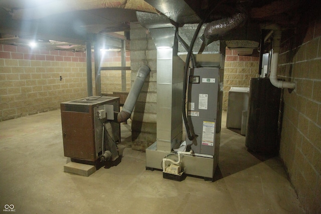 12 E N St, New Palestine, IN 46163 - unfinished basement with water heater and concrete block wall