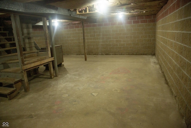 12 E N St, New Palestine, IN 46163 - unfinished basement featuring concrete block wall