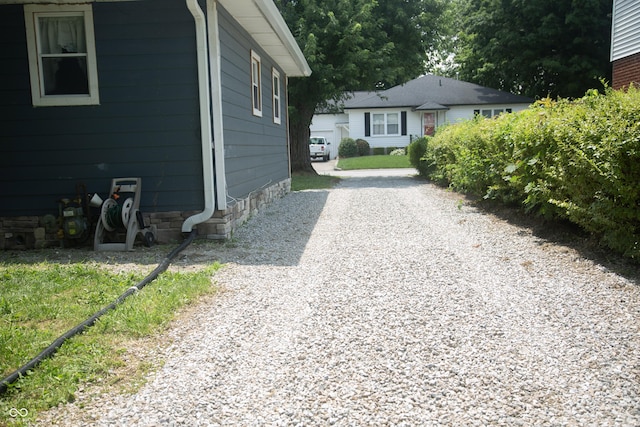 12 E N St, New Palestine, IN 46163 - view of home's exterior with driveway