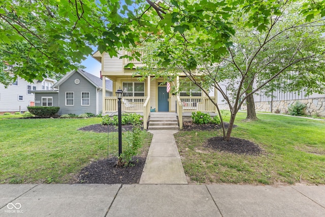 2232 N Park Ave, Indianapolis, IN 46205 - view of front of house with a porch and a front yard
