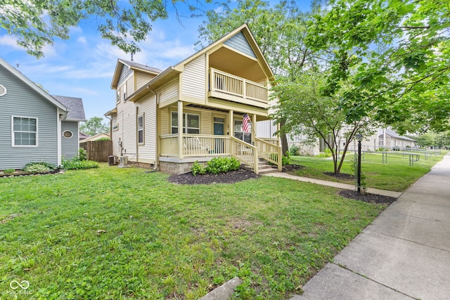 2232 N Park Ave, Indianapolis, IN 46205 - view of front of property featuring covered porch and a balcony