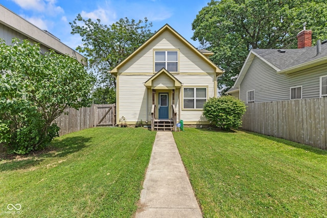 2232 N Park Ave, Indianapolis, IN 46205 - traditional home featuring a fenced backyard and entry steps