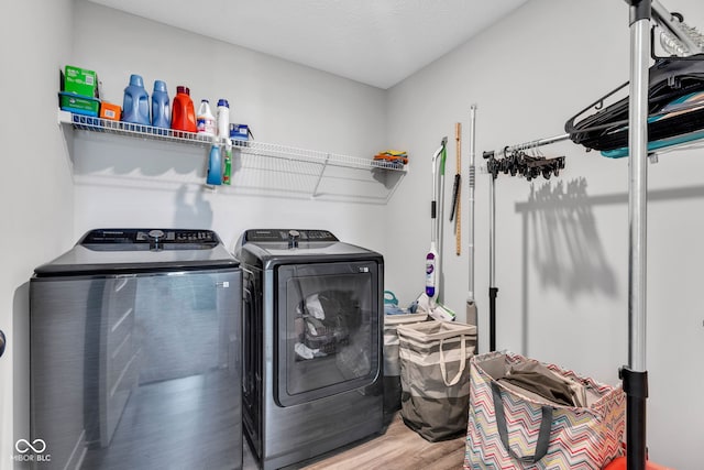 9978 Trafford Ct, Mccordsville, IN 46055 - washroom featuring washer and dryer and wood finished floors