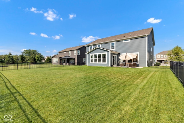 9978 Trafford Ct, Mccordsville, IN 46055 - back of property featuring a patio and a fenced backyard