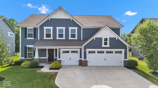 9978 Trafford Ct, Mccordsville, IN 46055 - craftsman house featuring board and batten siding, brick siding, driveway, a front lawn, and a garage