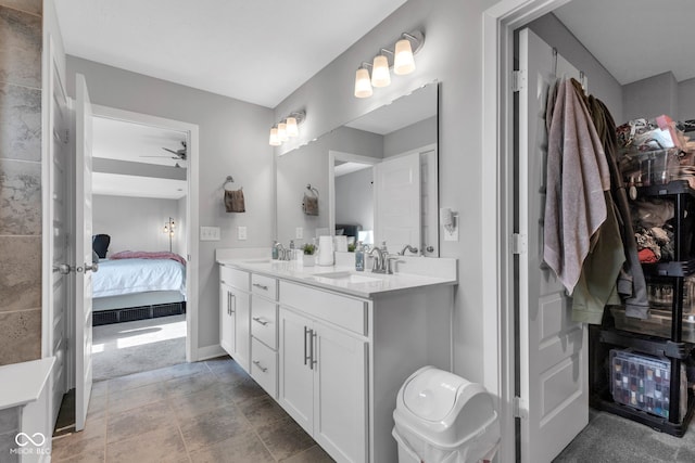 9978 Trafford Ct, Mccordsville, IN 46055 - full bathroom with double vanity, ensuite bath, and a ceiling fan