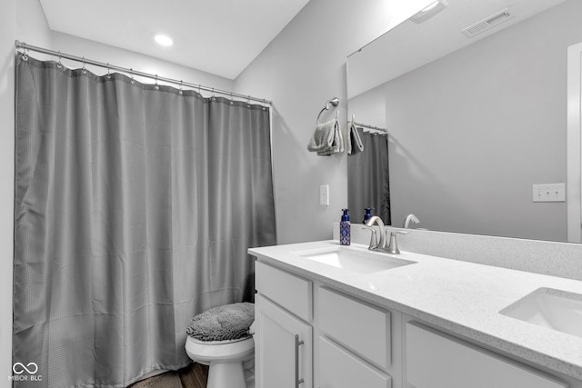 9978 Trafford Ct, Mccordsville, IN 46055 - full bath with double vanity, a shower with shower curtain, and recessed lighting