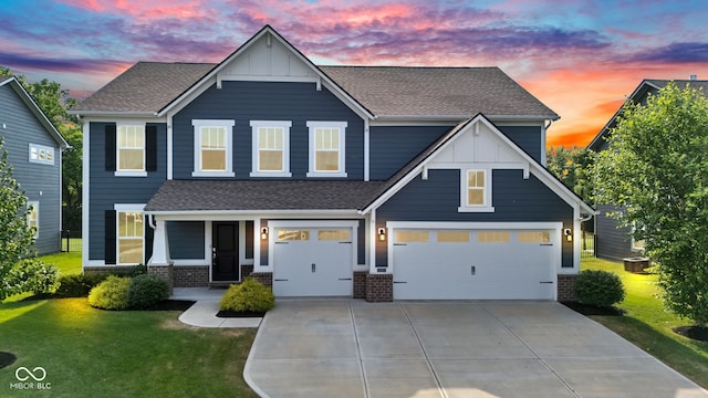 9978 Trafford Ct, Mccordsville, IN 46055 - view of front of home with board and batten siding, concrete driveway, brick siding, and a shingled roof
