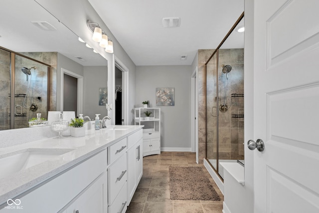 9978 Trafford Ct, Mccordsville, IN 46055 - bathroom with double vanity and a stall shower