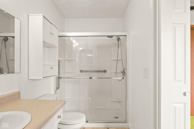 1620 W 300 S, Franklin, IN 46131 - full bathroom with a shower stall, vanity, and a textured ceiling
