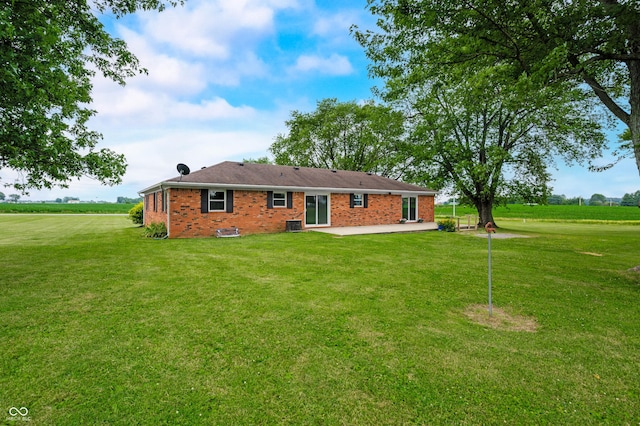 1620 W 300 S, Franklin, IN 46131 - rear view of property with a patio, a lawn, and brick siding