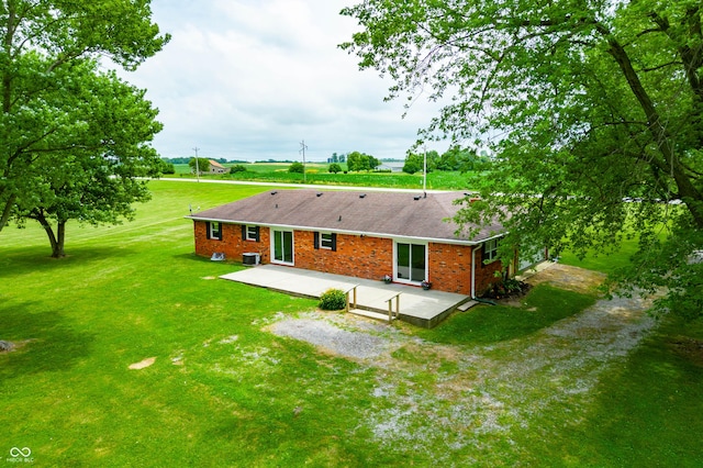 1620 W 300 S, Franklin, IN 46131 - back of property with brick siding, a lawn, and a patio