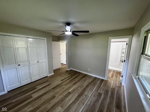 84 S Schenck Rd, Crawfordsville, IN 47933 - unfurnished bedroom featuring dark wood finished floors, a closet, and a ceiling fan