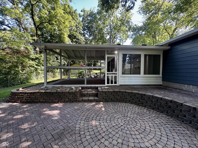 84 S Schenck Rd, Crawfordsville, IN 47933 - view of patio / terrace featuring a sunroom