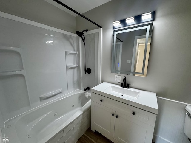 84 S Schenck Rd, Crawfordsville, IN 47933 - full bath with vanity, a combined bath / shower with jetted tub, and wood finished floors