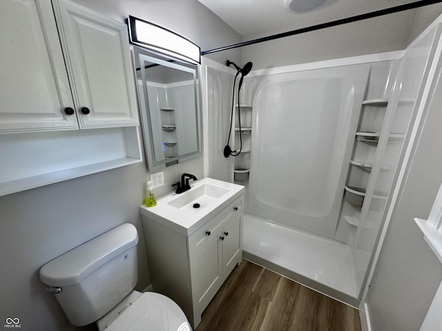 84 S Schenck Rd, Crawfordsville, IN 47933 - bathroom with wood finished floors, a shower, and vanity