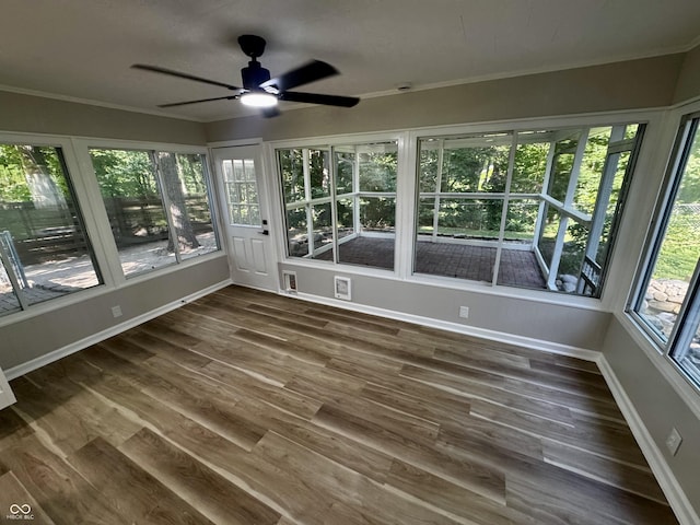 84 S Schenck Rd, Crawfordsville, IN 47933 - unfurnished sunroom featuring wood finished floors and ornamental molding