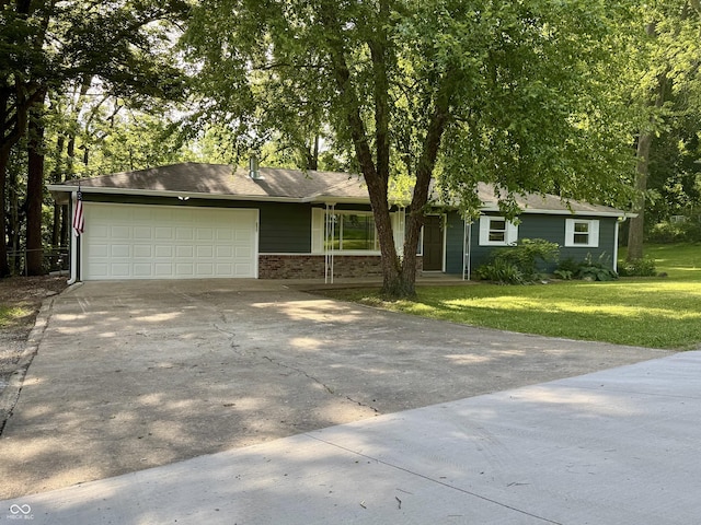 84 S Schenck Rd, Crawfordsville, IN 47933 - single story home with a garage, concrete driveway, a front yard, and brick siding
