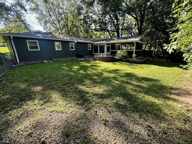 84 S Schenck Rd, Crawfordsville, IN 47933 - back of property featuring a sunroom