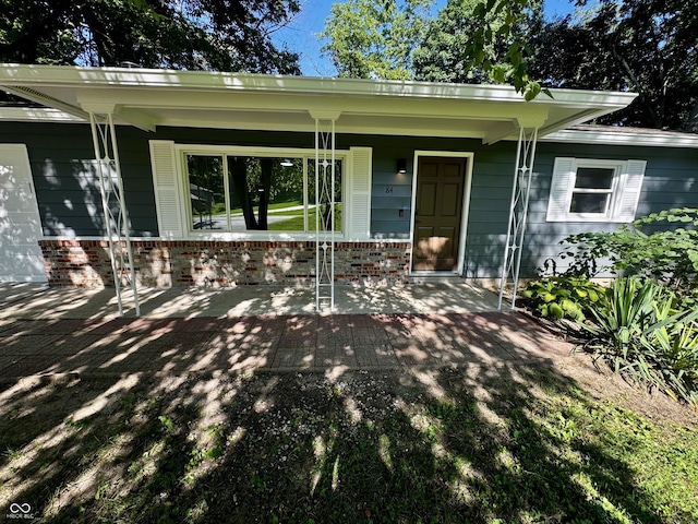 84 S Schenck Rd, Crawfordsville, IN 47933 - entrance to property featuring covered porch