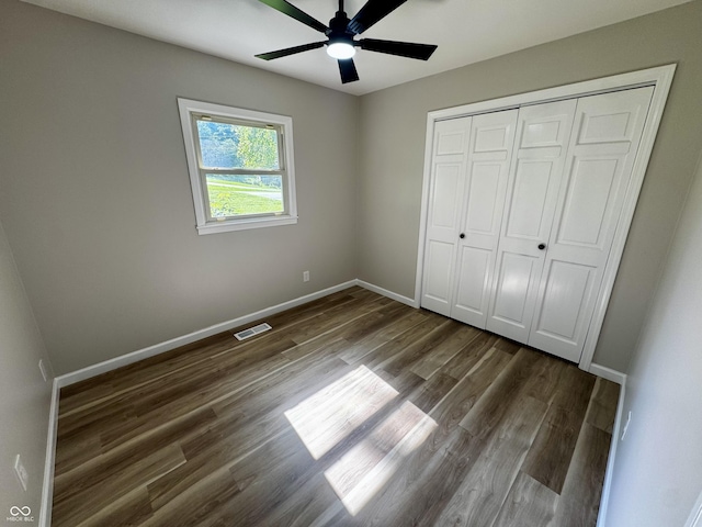 84 S Schenck Rd, Crawfordsville, IN 47933 - unfurnished bedroom with wood finished floors, a closet, and a ceiling fan