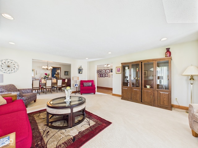 1014 Gray Squirrel Dr, Pendleton, IN 46064 - carpeted living room with a chandelier and recessed lighting