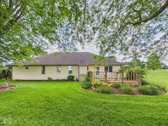 1014 Gray Squirrel Dr, Pendleton, IN 46064 - back of house with a deck, a lawn, and roof with shingles