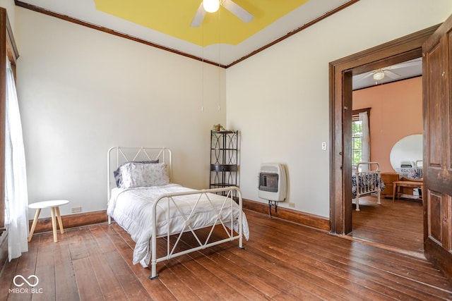 9665 N County Rd 250 E, Frankfort, IN 46041 - bedroom with heating unit, hardwood / wood-style floors, and ornamental molding