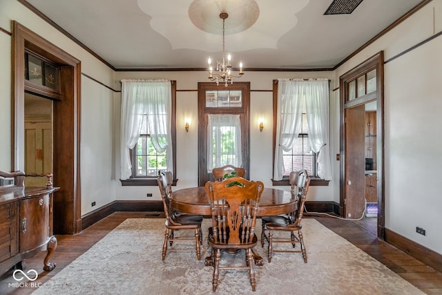 9665 N County Rd 250 E, Frankfort, IN 46041 - dining area featuring a chandelier, wood finished floors, and ornamental molding