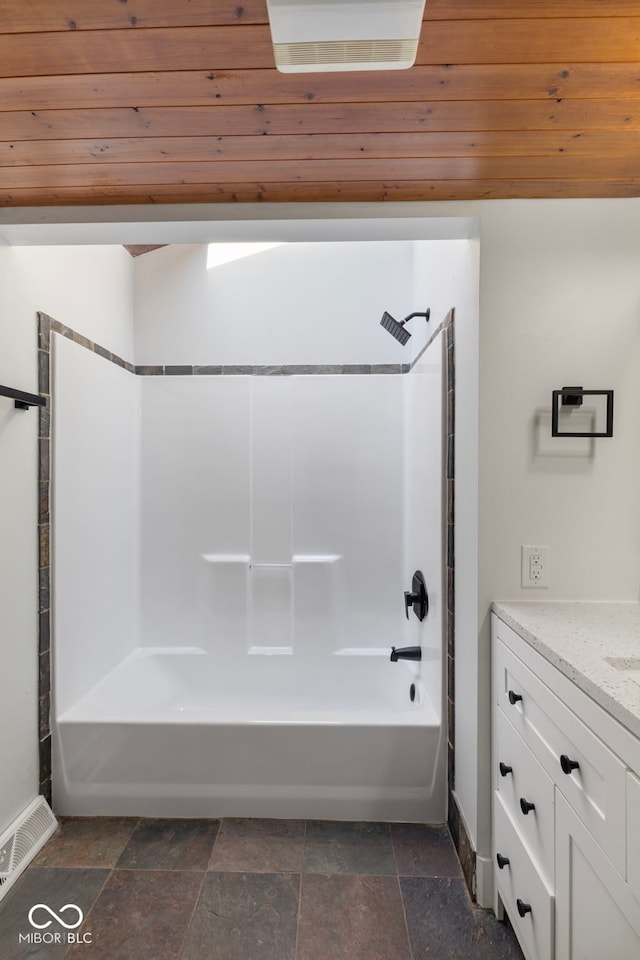 4622 S Franklin Rd, Indianapolis, IN 46239 - bathroom with stone tile flooring,  shower combination, and vanity