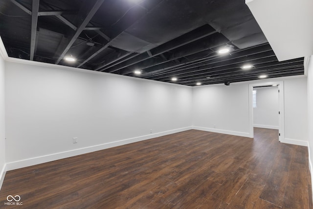 4622 S Franklin Rd, Indianapolis, IN 46239 - finished below grade area with dark wood finished floors and baseboards